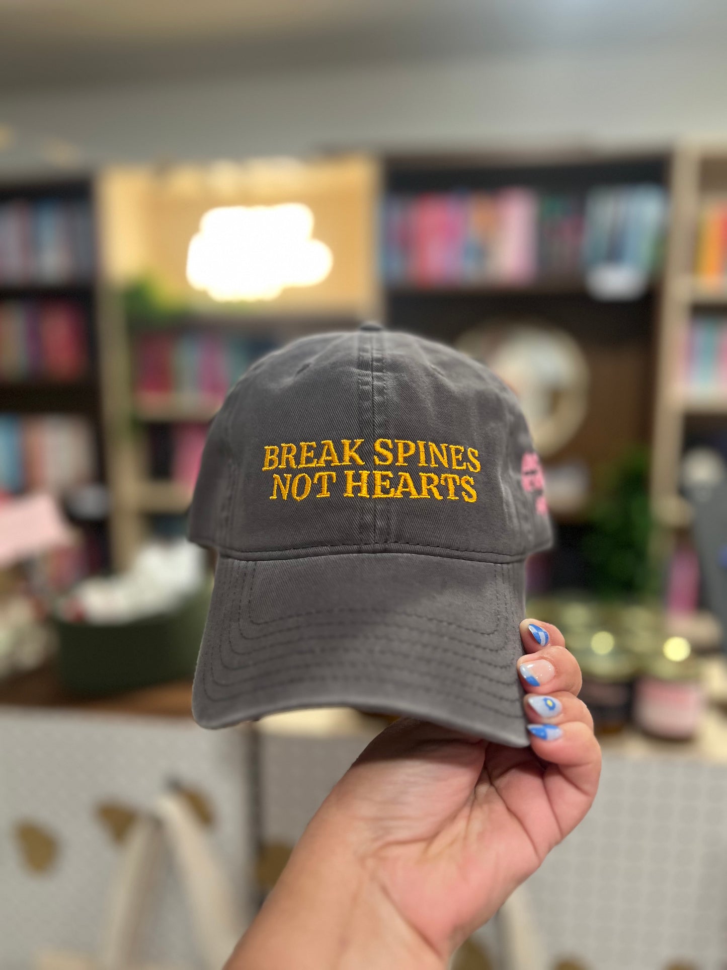 Break Spines Not Hearts Hat